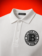 Balmain Paris Logo Piqué Polo Shirt – White